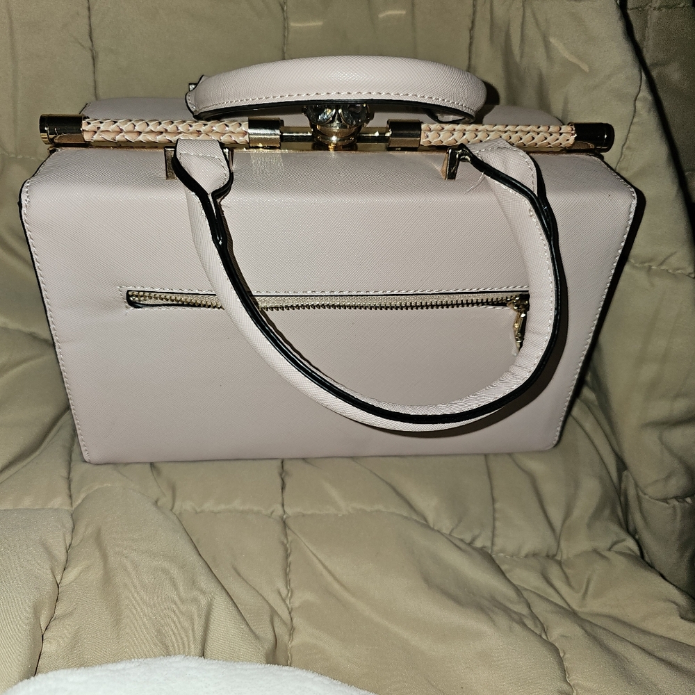 Light pink crossbody with diamond closure